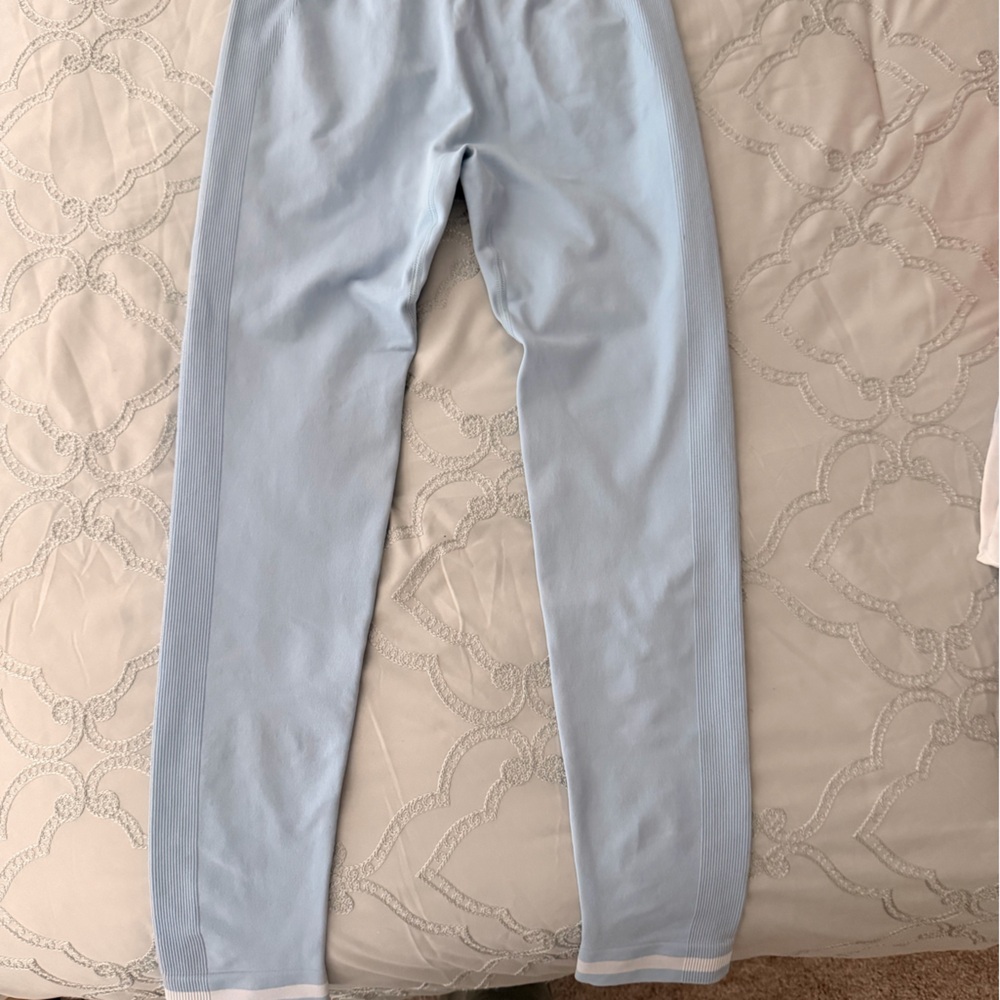 Light Blue Knit Compression Leggings with White Stripe Cuffs.